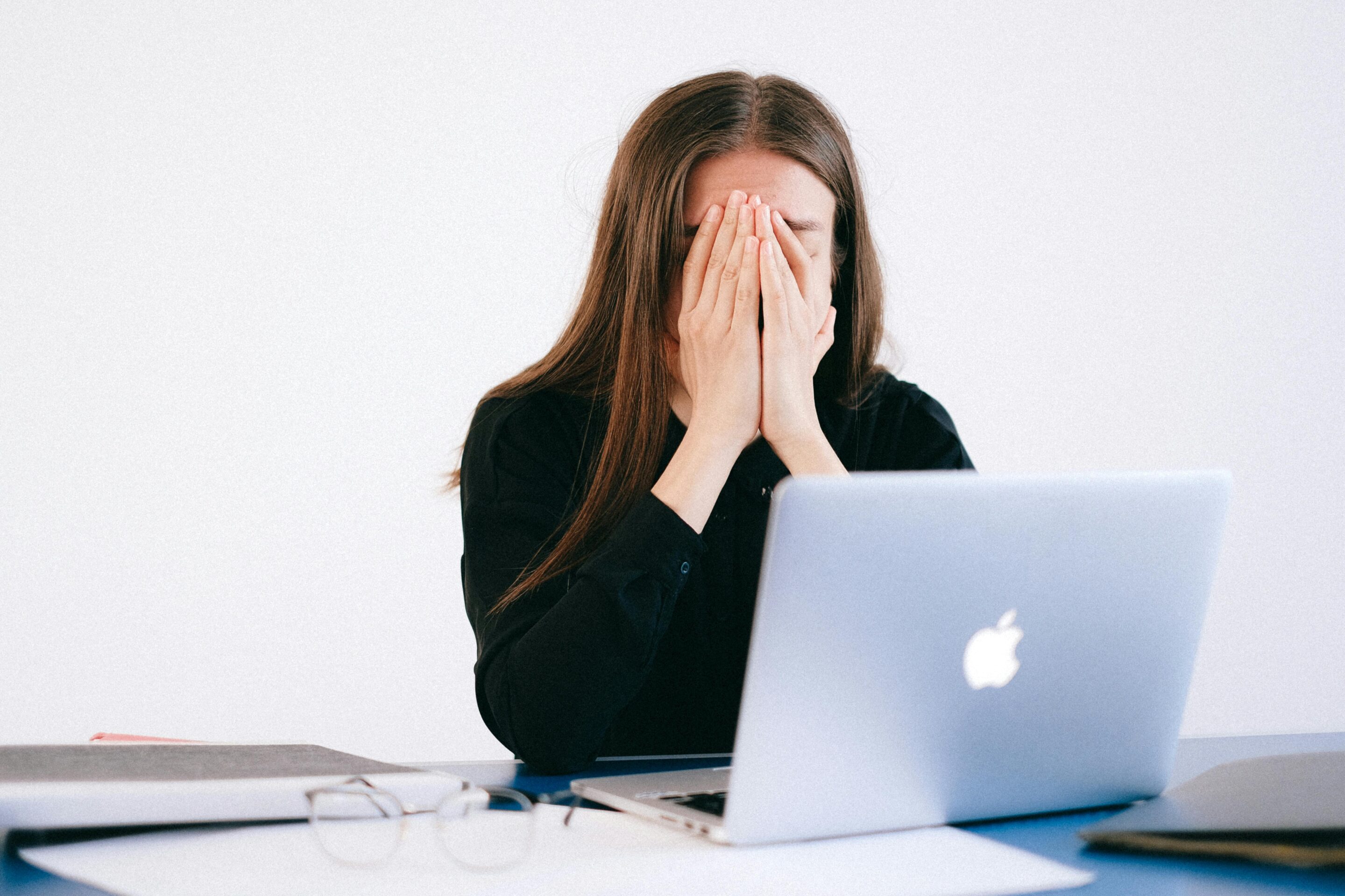 woman stressed at laptop